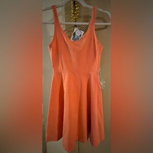 Orange peplum dress